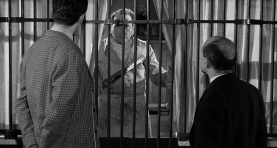 Alfred Adam as Emile Barberot, a butcher, in MAIGRET SETS A TRAP.