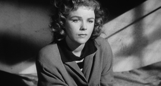 An imprisoned Sally (Sally Forrest) remembers what brought her to this moment in Ida Lupino's NOT WANTED.