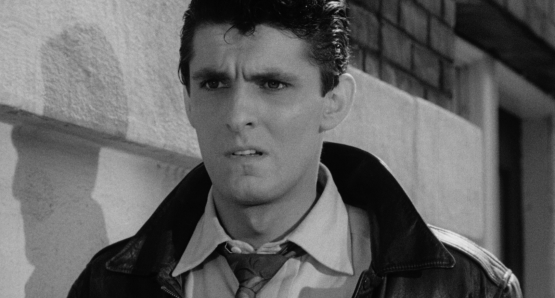 Keefe Brasselle as Drew Baxter in Ida Lupino's NOT WANTED.