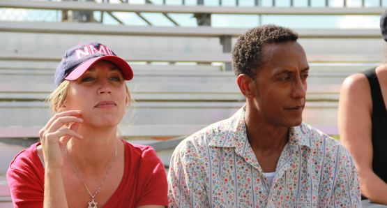 Debbie (Daisy Haggard) and Byrd (Andre Royo) watching Josh's baseball game.