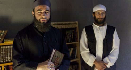 Terrorist leader Abou Zoubeir (left) and Zaid (played by Rabii Tadlaoui). 