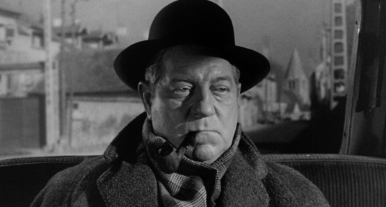 Jean Gabin as Inspector Jules Maigret in MAIGRET AND THE ST. FIACRE CASE.