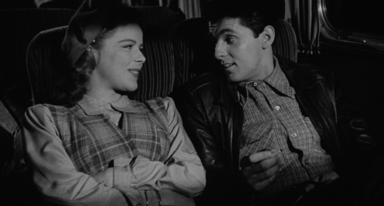 Sally (Sally Forrest) and Drew (Keefe Brasselle) meet cute on a long-distance bus trip in Ida Lupino's NOT WANTED.